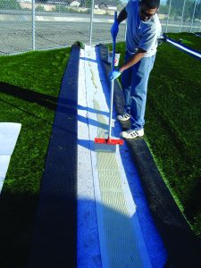 Adhering TurfTop seam.