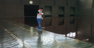 Squeegie-applying ElastoFloor layer