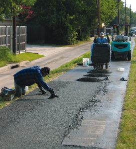 Installing EverTop on walking & jogging trail.