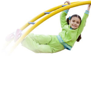 girl swinging on playground bars
