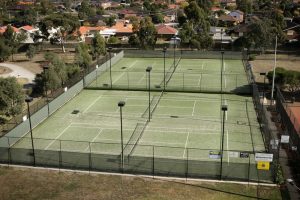 Omnicourt outdoor turf tennis courts.