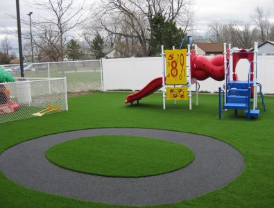 PlayBound TurfTop with rubber trike path at childcare facility.