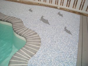 AquaFlex with permanent graphics in surface of pool surround.