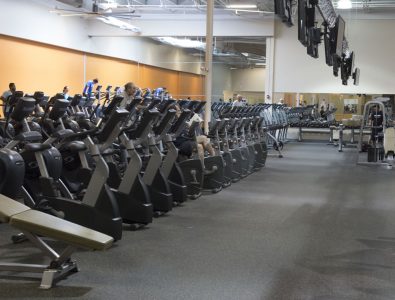 Performance roll flooring under fitness machines.