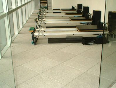 Gym equipment on diagonally-laid Performance UltraTile.