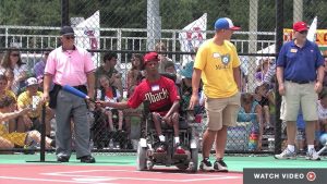 A softball game taking place on a Miracle League field