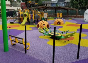 Colorful PlayBound Poured-in-Place surface at Ludlow Taylor Elementary School in Washington DC.